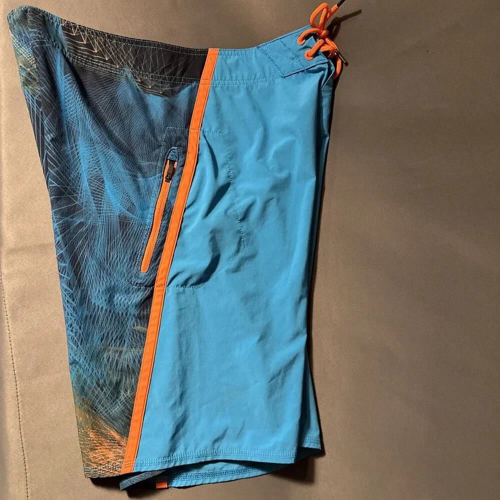 Oakley 32 Blue Board Shorts Zip Pocket Orange Regular Fit Swim Skull Y2K Print